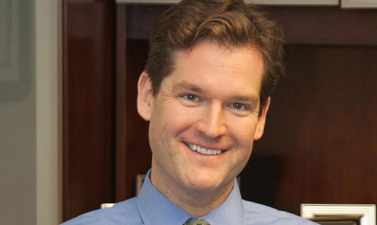 Dr. Hapworth smiling.